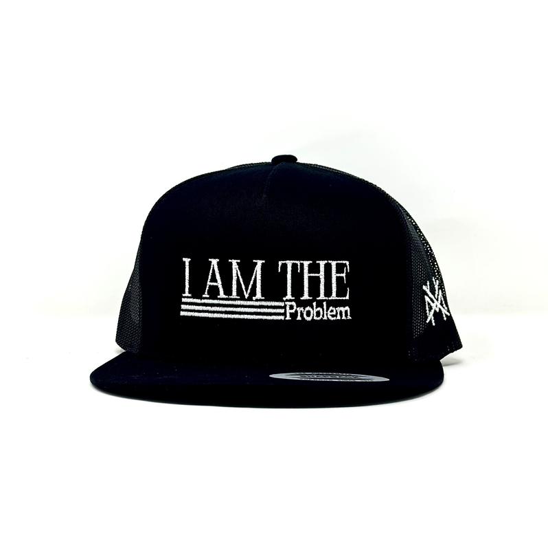 I Am The Problem Trucker Hat by The Mad Hatter Company