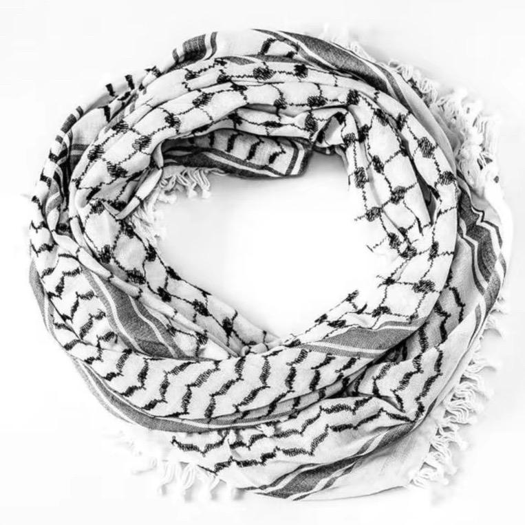 Traditional woven Palestinian keffiyeh, kufiya,shemagh, or scarf with classic Palestinian patterns